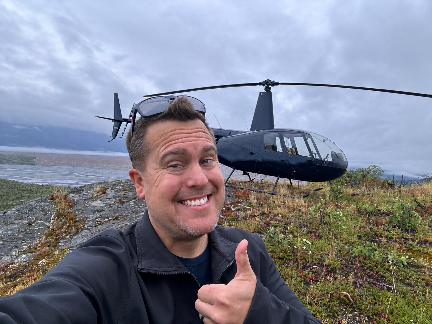 Brett Baker with a helicopter in Alaska
